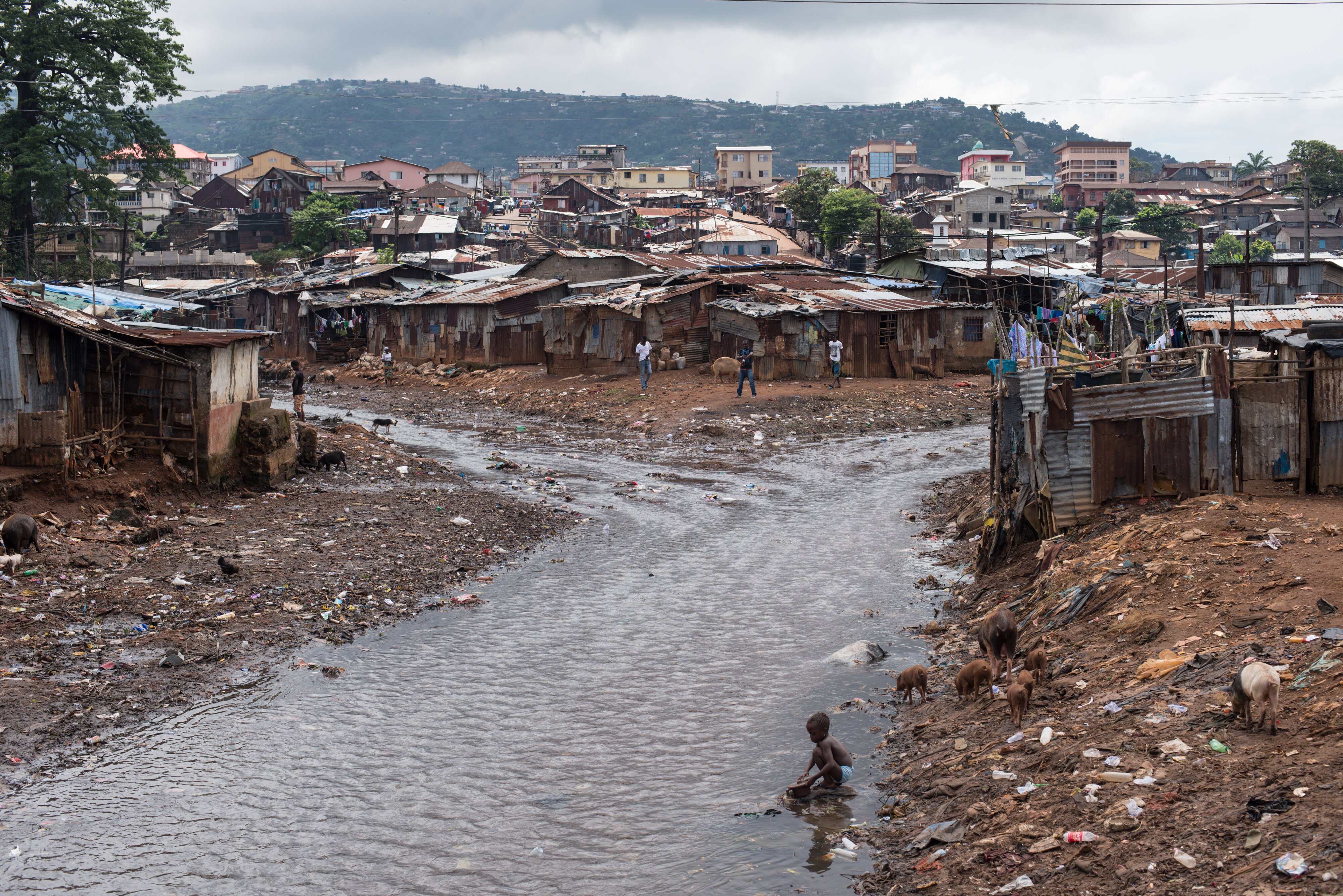 A reality check: Africa may be a continent with beautiful landscapes, amazing artifacts, colorful dresses and photogenic people, but out of the top 30 of the poorest countries in the world 24 are in Africa. Kroo Bay Slum, Freetown, Sierra Leone.