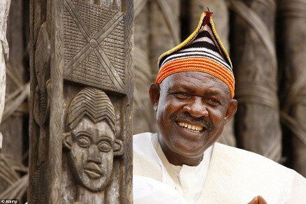 King Abumbi II of Bafut - northwest of Bafoussam - in front of his traditional palace. Traditional royalty is often still in place in modern Cameroon.