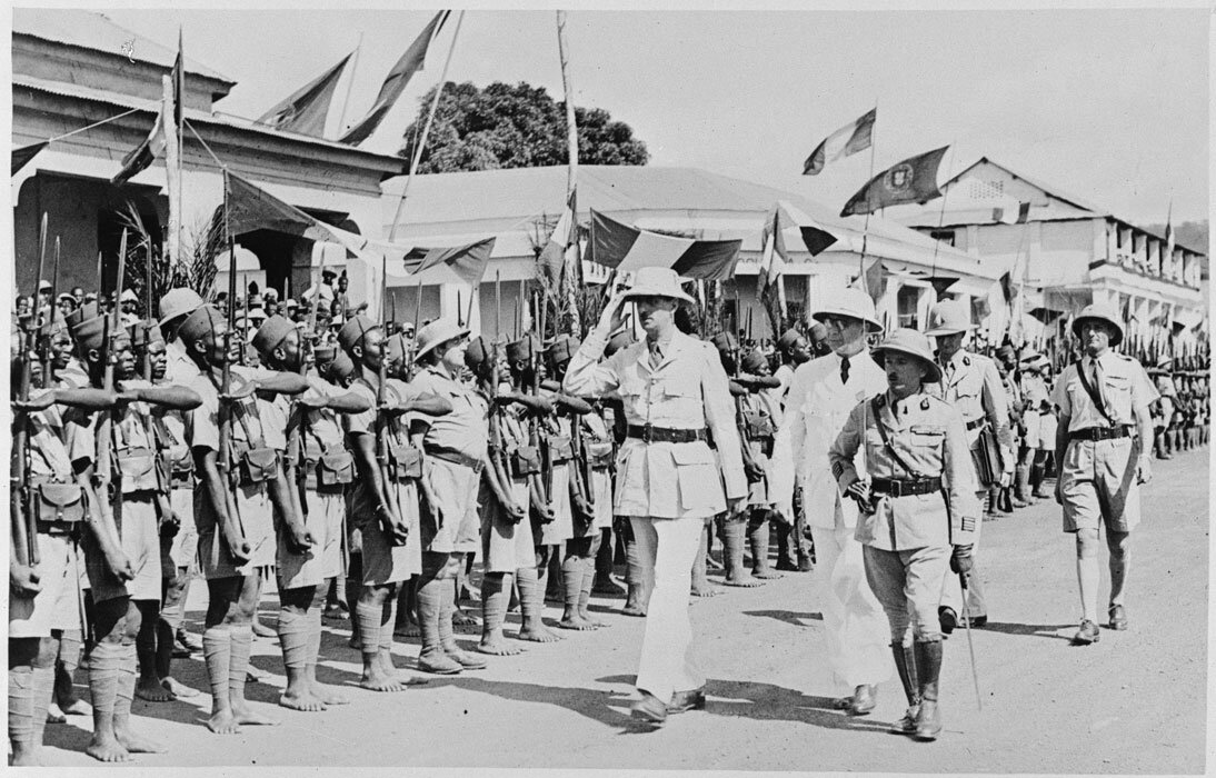 De Gaulle inspecting the Free French Forces in 1940. Ubangi Shari was one of the first colonies to join the Free French led by De Gaulle.